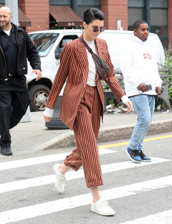 Kendall Jenner Accessorizes a Striped Suit with a Louis Vuitton Fanny Pack Kendall Jenner Accessorizes a Striped Suit with a Louis Vuitton Fanny Pack