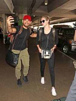 Kate Upton Goes Casual In All Black At LAX