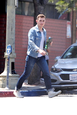 Dave Franco with tablet and bottled drink seen out in Los Angeles Dave Franco with tablet and bottled drink seen out in Los Angeles