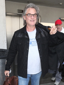 Goldie Hawn and Kurt Russell arrive at the airport