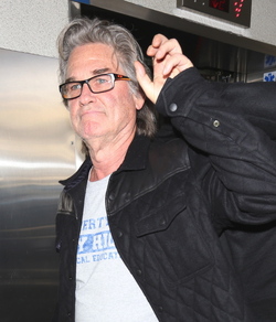 Goldie Hawn and Kurt Russell arrive at the airport