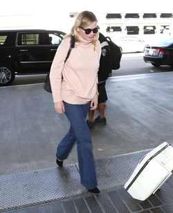 Kirsten Dunst arrives back at LAX Kirsten Dunst arrives back at LAX