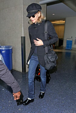 Meg Ryan Tries To Keep A Low Profile Arriving In L.A. After CFDA Awards