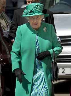 Queen Elizabeth II and Prince Philip Duke of Edinburgh attend a service to mark the 100th anniversary of the Order of the British Empire at St Paul s Cathedral in London.