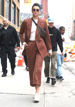 Kendall Jenner Accessorizes a Striped Suit with a Louis Vuitton Fanny Pack Kendall Jenner Accessorizes a Striped Suit with a Louis Vuitton Fanny Pack
