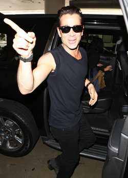 Colin Farrell was spotted in a sleeveless t shirt at LAX