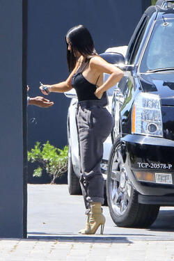 Kim Kardashian shows off her famous derriere in sweatpants