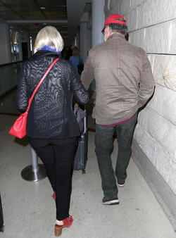 Helen Mirren and Taylor Hackford return from New Orleans where Helen gave a speech for the graduating students 