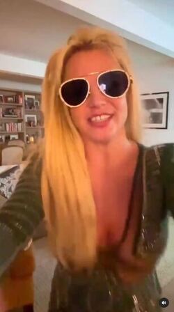 Britney Spears dances around in bed and gets licked by man Britney Spears dances around in bed and gets licked by man