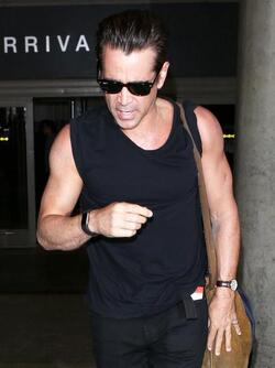 Colin Farrell was spotted in a sleeveless t shirt at LAX