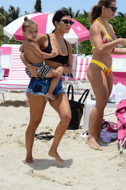 Kourtney Kardashian seen out and about at the beach wearing a bikini on June 11 2017 in Miami Florida.