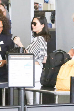 Olivia Munn pictured at Los Angeles International Airport