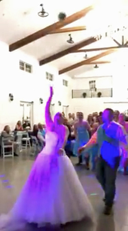 BRAVE BRIDE WITH CANCER THROWS WIG BEFORE FLINGING BOUQUET AT WEDDING RECEPTION