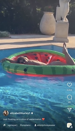 Liz Hurley poses totally nude on a slice of watermelon Liz Hurley poses totally nude on a slice of watermelon