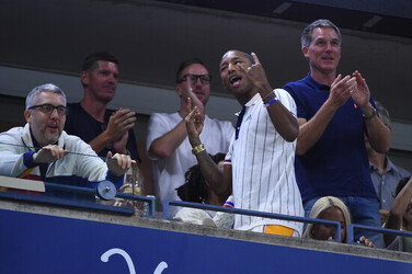 Pharrell Williams attends the US Open Pharrell Williams attends the US Open