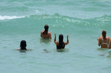 Hailey Baldwin and Kourtney Kardashian are seen out and about at the beach wearing bikinis on June 11 2017 in Miami Florida.