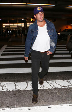 Comedic actor Will Arnett arrives at LAX sporting a cool denim jacket facial scruff and a Lakers cap as he makes his way to his vehicle. Comedic actor Will Arnett arrives at LAX sporting a cool denim jacket facial scruff and a Lakers cap as he makes his way to his vehicle.