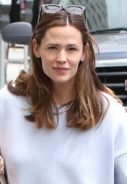 Jennifer Garner got out for a visit to a Brentwood salon exiting with her hair looking appropriately awesome in jeans and a pale blue sweater.