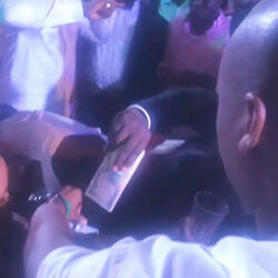 VID Billionaire Shoots Cash At Guests With Golden Gun